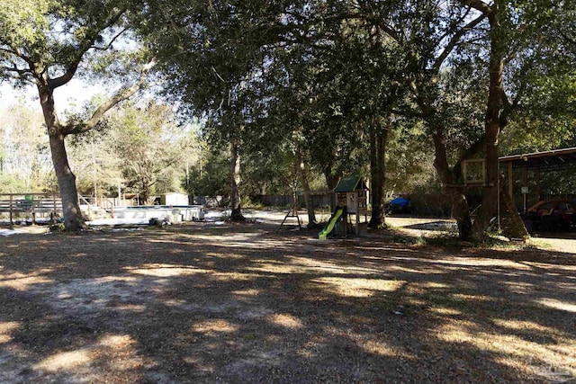 view of yard featuring a playground