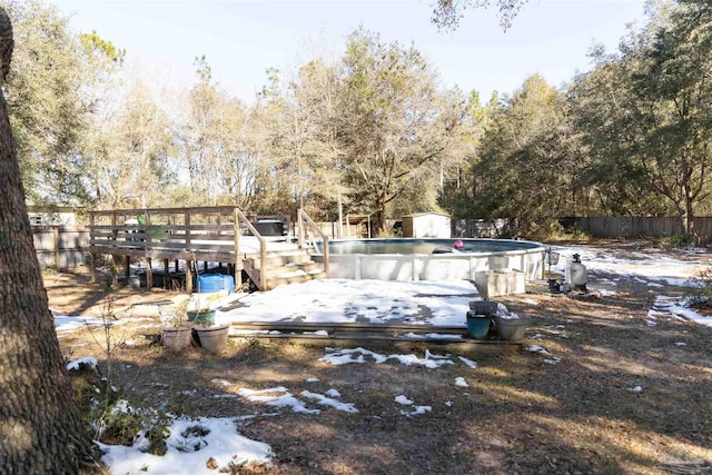 exterior space with a swimming pool side deck