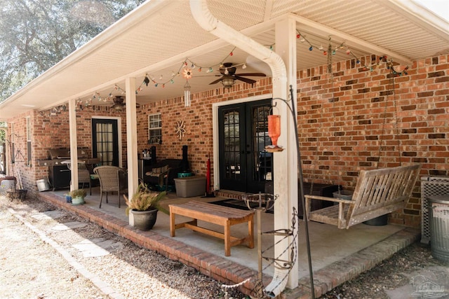 view of patio featuring ceiling fan