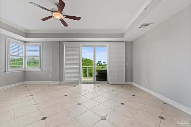 1700 Scenic Hwy Unit 404, Pensacola, FL 32503 - spare room with crown molding, a raised ceiling, baseboards, a ceiling fan, and light tile patterned floors