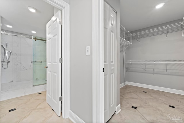 1700 Scenic Hwy Unit 404, Pensacola, FL 32503 - walk in closet with tile patterned flooring