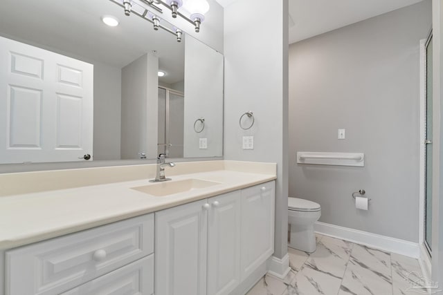 1700 Scenic Hwy Unit 404, Pensacola, FL 32503 - bathroom featuring marble finish flooring, vanity, a shower with shower door, toilet, and baseboards