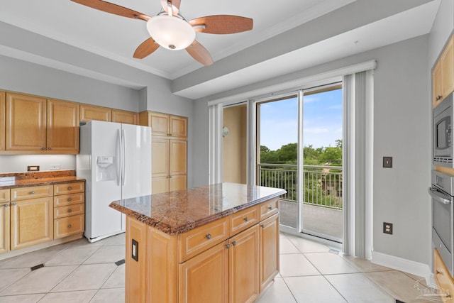 1700 Scenic Hwy Unit 404, Pensacola, FL 32503 - kitchen with white refrigerator with ice dispenser, ornamental molding, dark stone countertops, light tile patterned flooring, and a ceiling fan