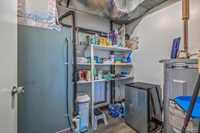 utility room with water heater