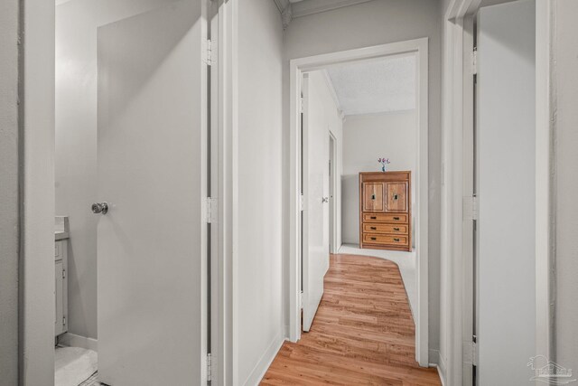 hallway featuring light wood-style flooring