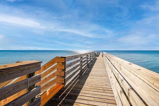 surrounding community featuring a water view