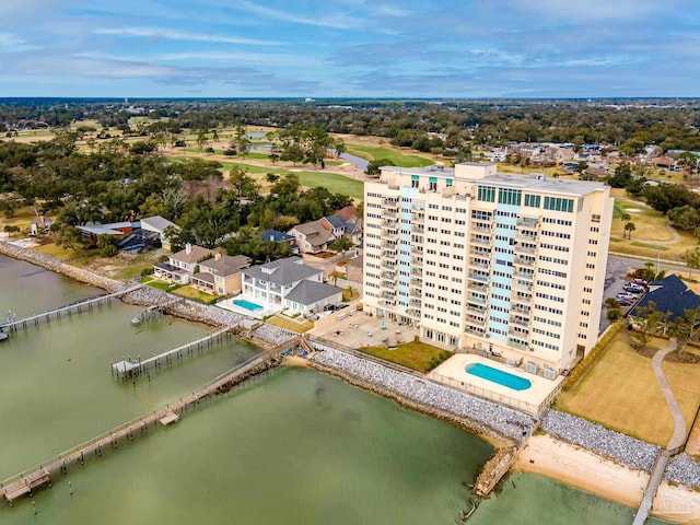 birds eye view of property featuring a water view