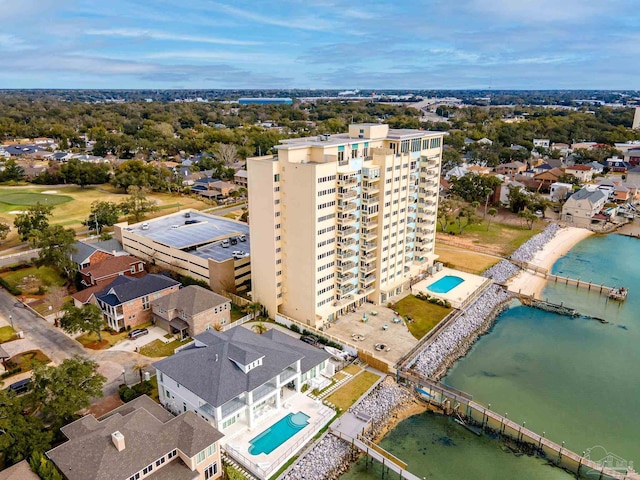 birds eye view of property with a water view