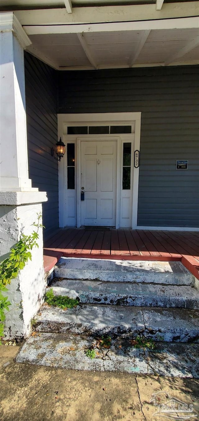 property entrance with a porch