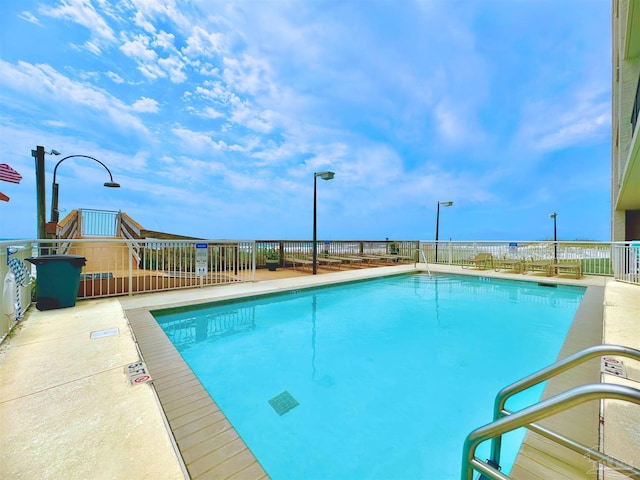 13817 Perdido Key Dr Unit 204, Pensacola, FL 32507 - community pool featuring fence