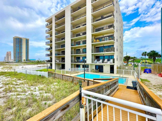 13817 Perdido Key Dr Unit 204, Pensacola, FL 32507 - exterior space featuring a community pool and fence