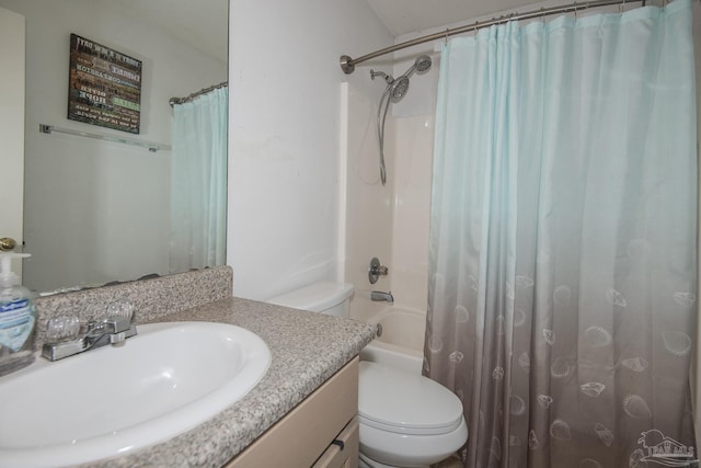 bathroom with vanity, shower / bath combination with curtain, and toilet