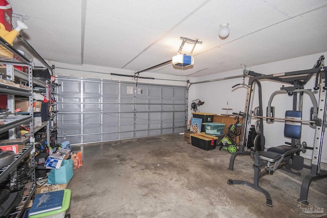 garage featuring a garage door opener