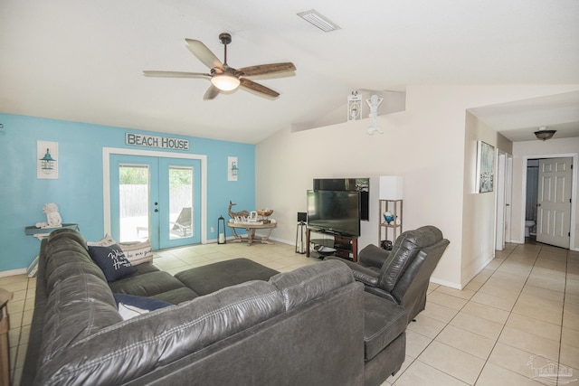living room with a ceiling fan, french doors, and light tile patterned floors