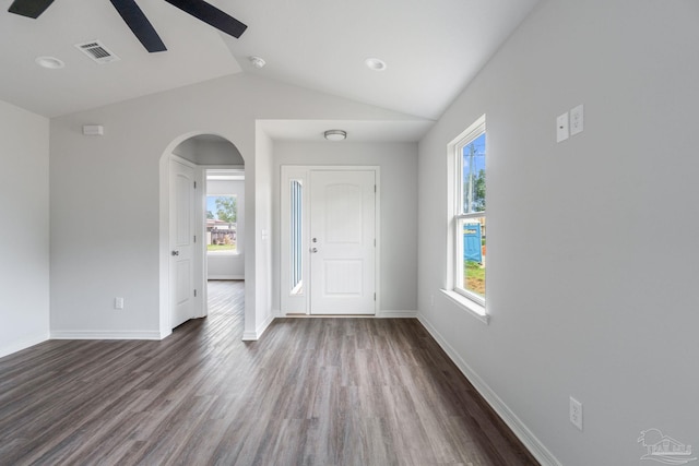 8069 Doris Ave, Pensacola, FL 32534 - foyer featuring vaulted ceiling, dark wood-type flooring, arched walkways, a ceiling fan, and baseboards