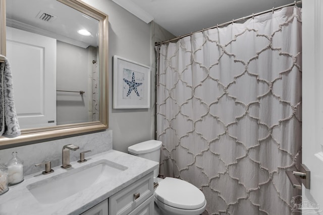 bathroom featuring vanity, a shower with curtain, and toilet