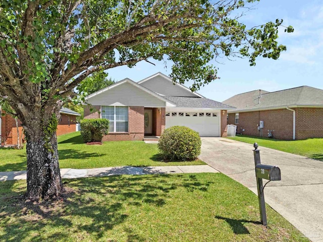 28 Easton St, Cantonment, FL 32533 - ranch-style house with brick siding, an attached garage, concrete driveway, and a front yard