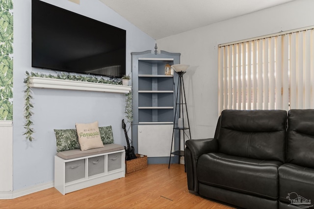 28 Easton St, Cantonment, FL 32533 - sitting room featuring wood finished floors and vaulted ceiling