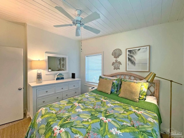 1207 Ariola Dr, Pensacola Beach, FL 32561 - bedroom featuring wooden ceiling, carpet, crown molding, and a ceiling fan