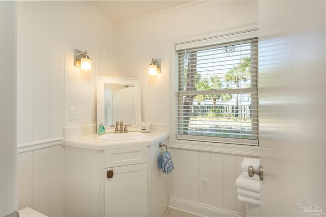 1207 Ariola Dr, Pensacola Beach, FL 32561 - bathroom with vanity and a decorative wall