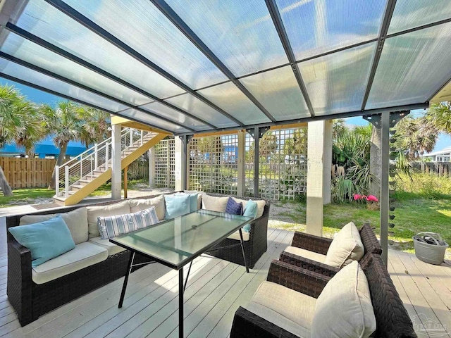 1207 Ariola Dr, Pensacola Beach, FL 32561 - sunroom / solarium with outdoor lounge area and outdoor dining area