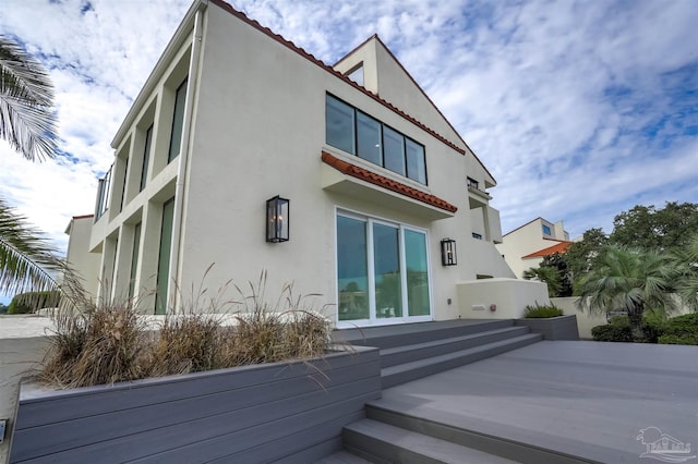 rear view of property with a patio