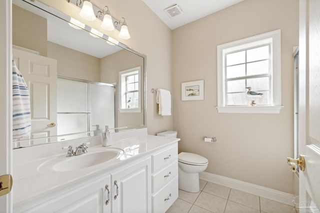 bathroom featuring tile patterned flooring, visible vents, baseboards, toilet, and an enclosed shower