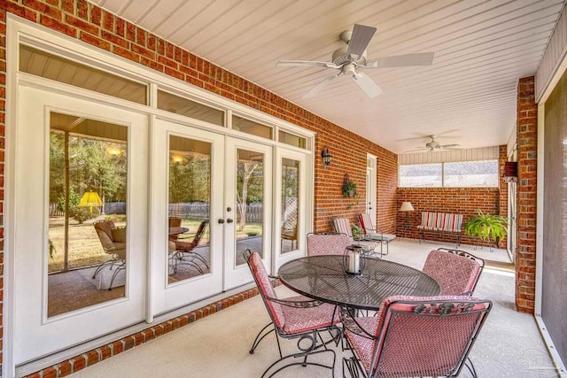 view of patio featuring french doors, a porch, and a ceiling fan