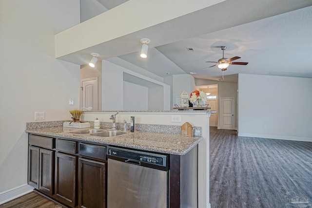 257 Millet Cir, Cantonment, FL 32533 - kitchen with stainless steel dishwasher, dark wood finished floors, a sink, baseboards, and a peninsula