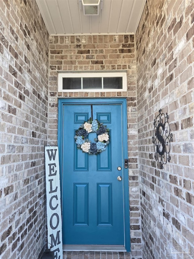 257 Millet Cir, Cantonment, FL 32533 - property entrance featuring brick siding