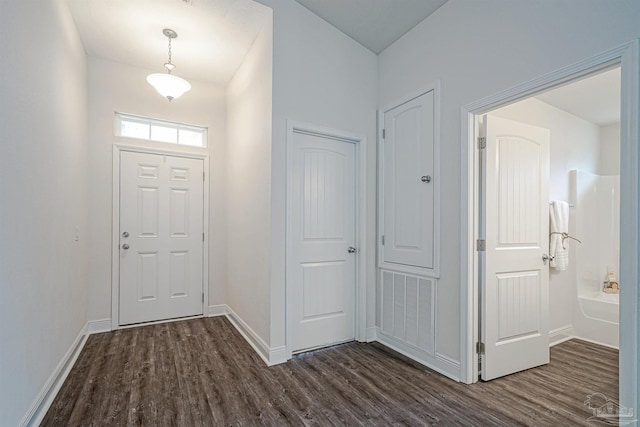 257 Millet Cir, Cantonment, FL 32533 - foyer entrance with baseboards and dark wood-style flooring