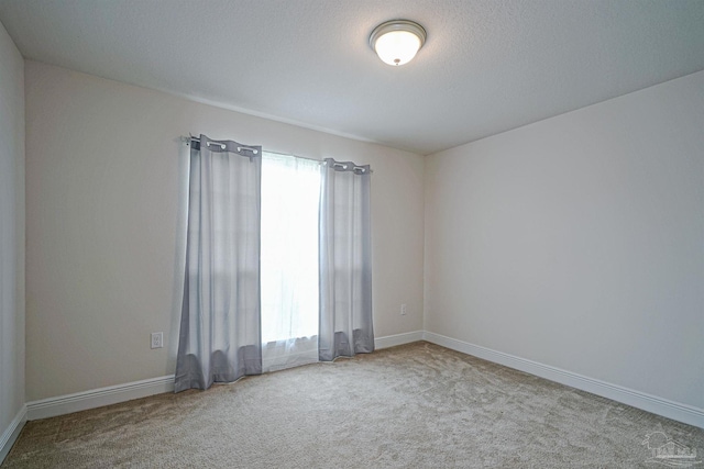 257 Millet Cir, Cantonment, FL 32533 - carpeted empty room with a healthy amount of sunlight and baseboards