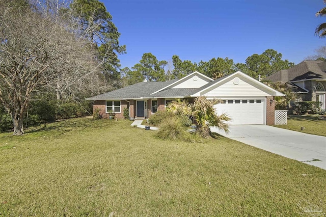 ranch-style home featuring an attached garage, brick siding, and a front yard