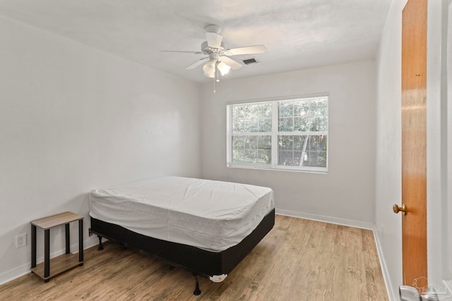 bedroom featuring ceiling fan and light wood-type flooring