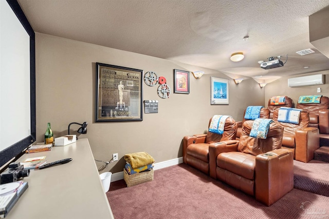 cinema room with a textured ceiling, carpet floors, and a wall mounted air conditioner