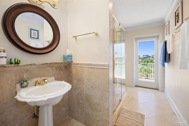 bathroom featuring tile patterned floors and ornamental molding