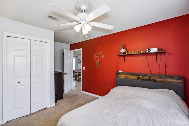 bedroom featuring carpet, a closet, and ceiling fan