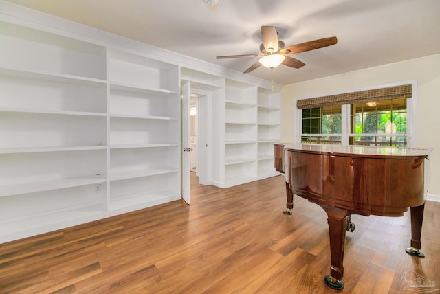 misc room featuring hardwood / wood-style floors and ceiling fan