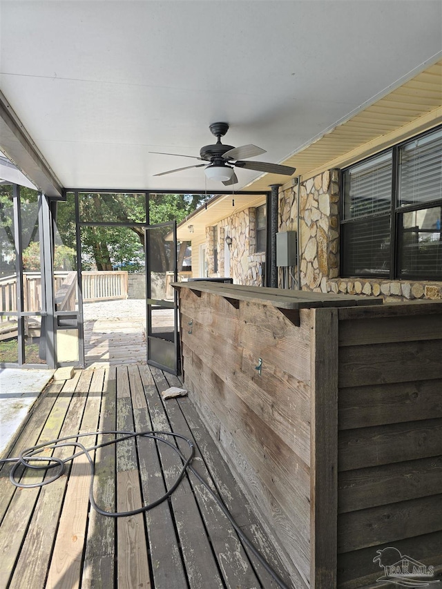 wooden terrace with ceiling fan