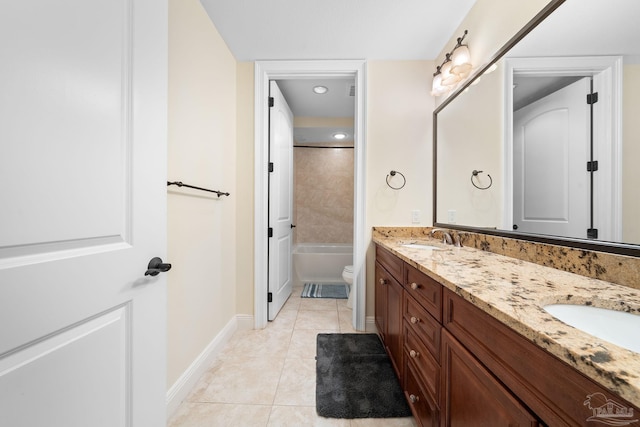 full bathroom featuring vanity, toilet, tile patterned flooring, and shower / bathing tub combination