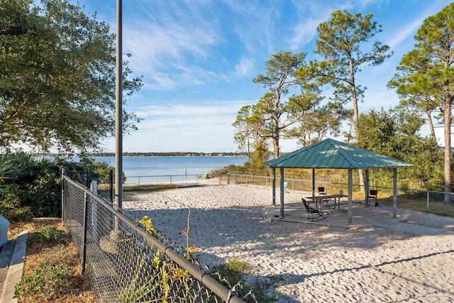 view of community featuring a gazebo and a water view