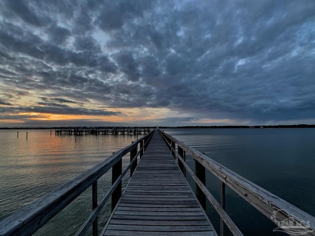 dock area featuring a water view