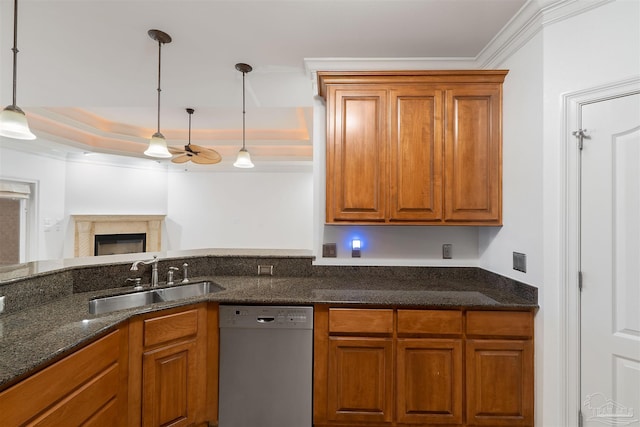 kitchen with sink, crown molding, dishwasher, and pendant lighting