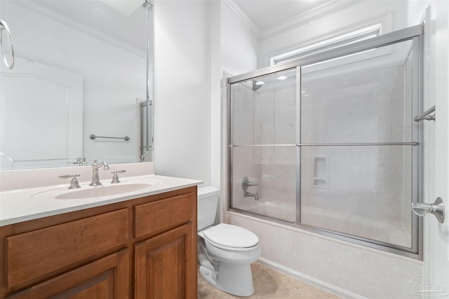 full bathroom featuring toilet, tile patterned flooring, ornamental molding, vanity, and enclosed tub / shower combo