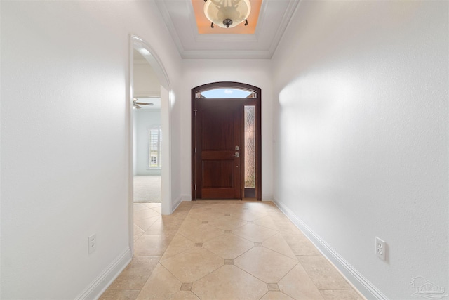 tiled entryway with ornamental molding