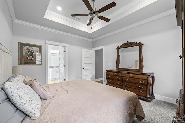 1223 Fenwick Ct, Cantonment, FL 32533 - bedroom with a tray ceiling, crown molding, carpet floors, ensuite bathroom, and ceiling fan