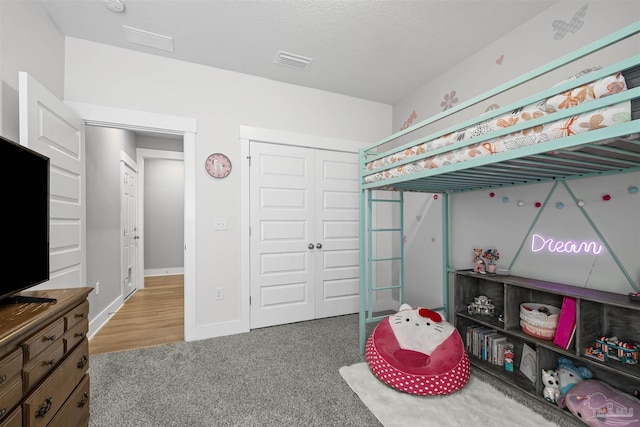 1223 Fenwick Ct, Cantonment, FL 32533 - carpeted bedroom with a closet and baseboards