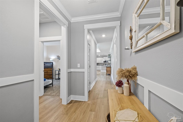 1223 Fenwick Ct, Cantonment, FL 32533 - hall with light wood finished floors and ornamental molding