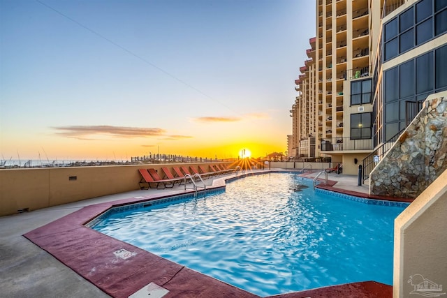 24230 Perdido Beach Blvd Unit 3087, Orange Beach, AL 36561 - pool at dusk with a patio area