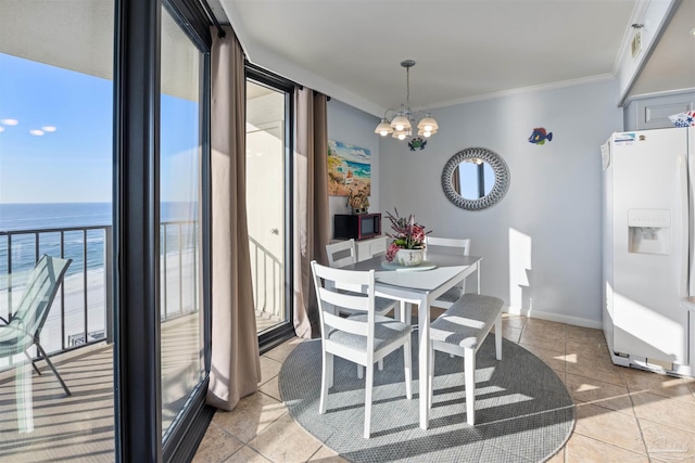 24230 Perdido Beach Blvd Unit 3087, Orange Beach, AL 36561 - dining area featuring floor to ceiling windows, a water view, crown molding, and a chandelier